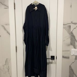 H&M long sleeve black maxi dress with drop of a high low hem